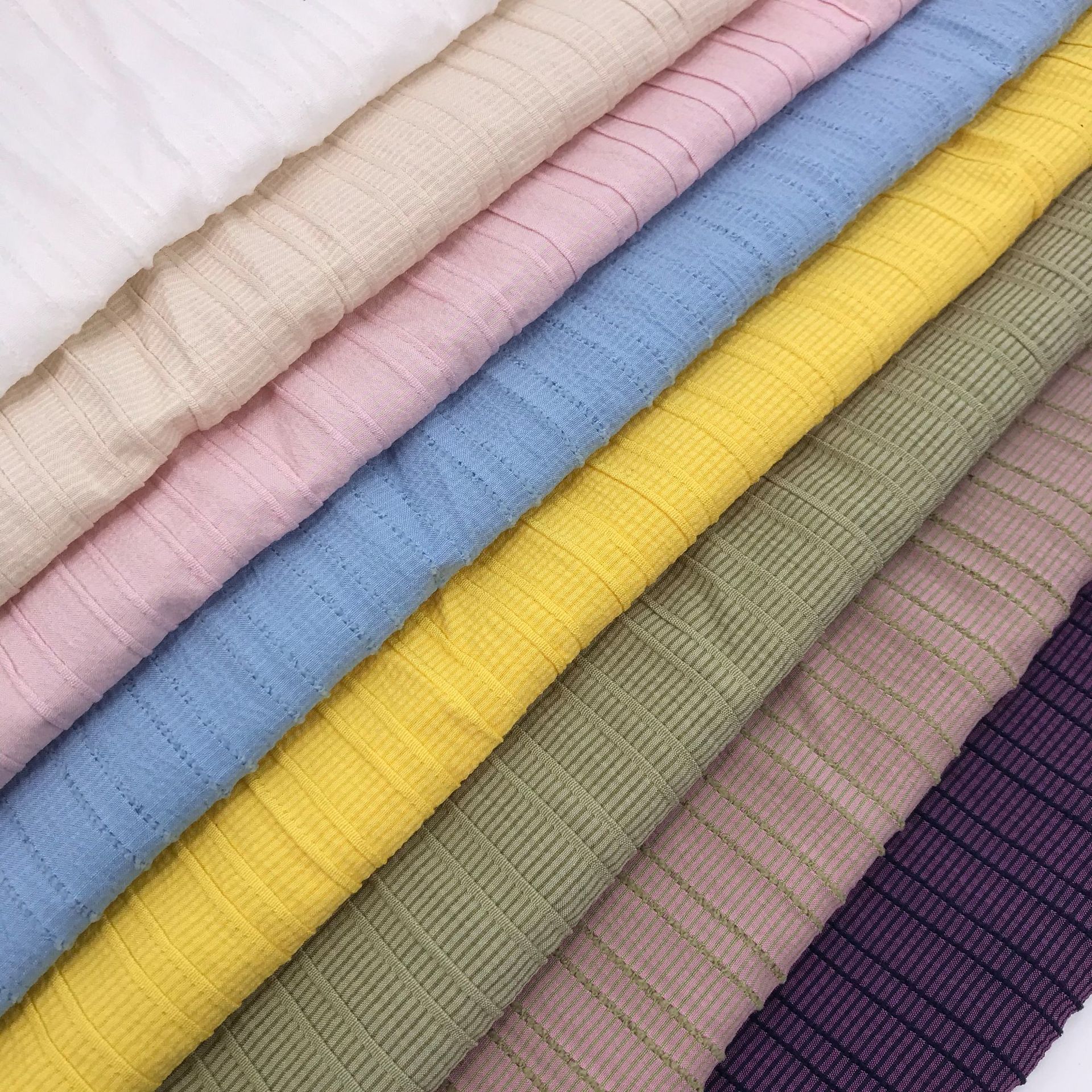 纯涤提花皱素色布 春夏女紫色连衣裙上衣纯色面料 2020新款条纹