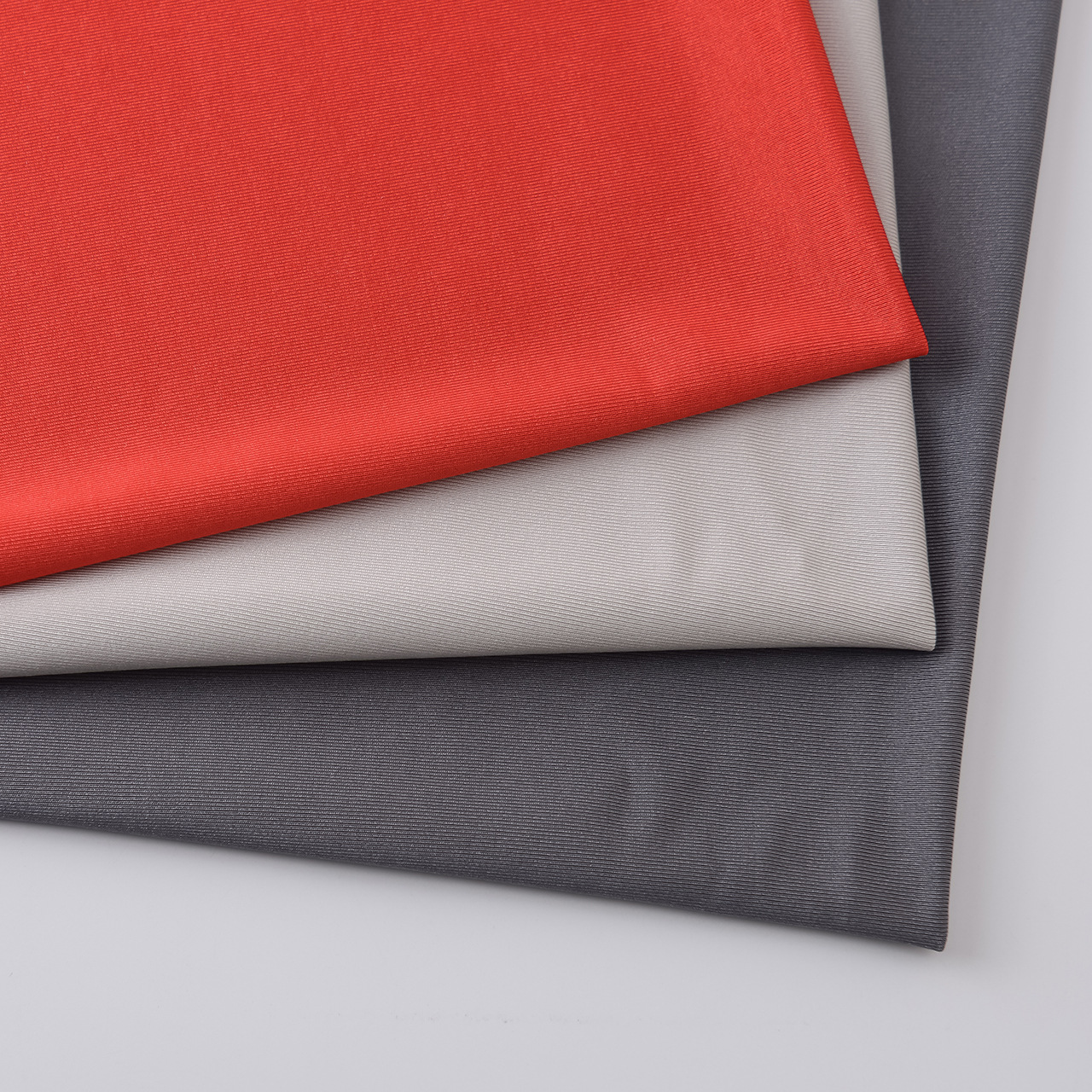 现货涤纶莱卡有光针织面料 骑行运动服面料 四面莱卡高弹内衣布料