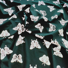 银色蝴蝶图案印花高亮反光布 时尚反光面料 服装反光印花弹力布