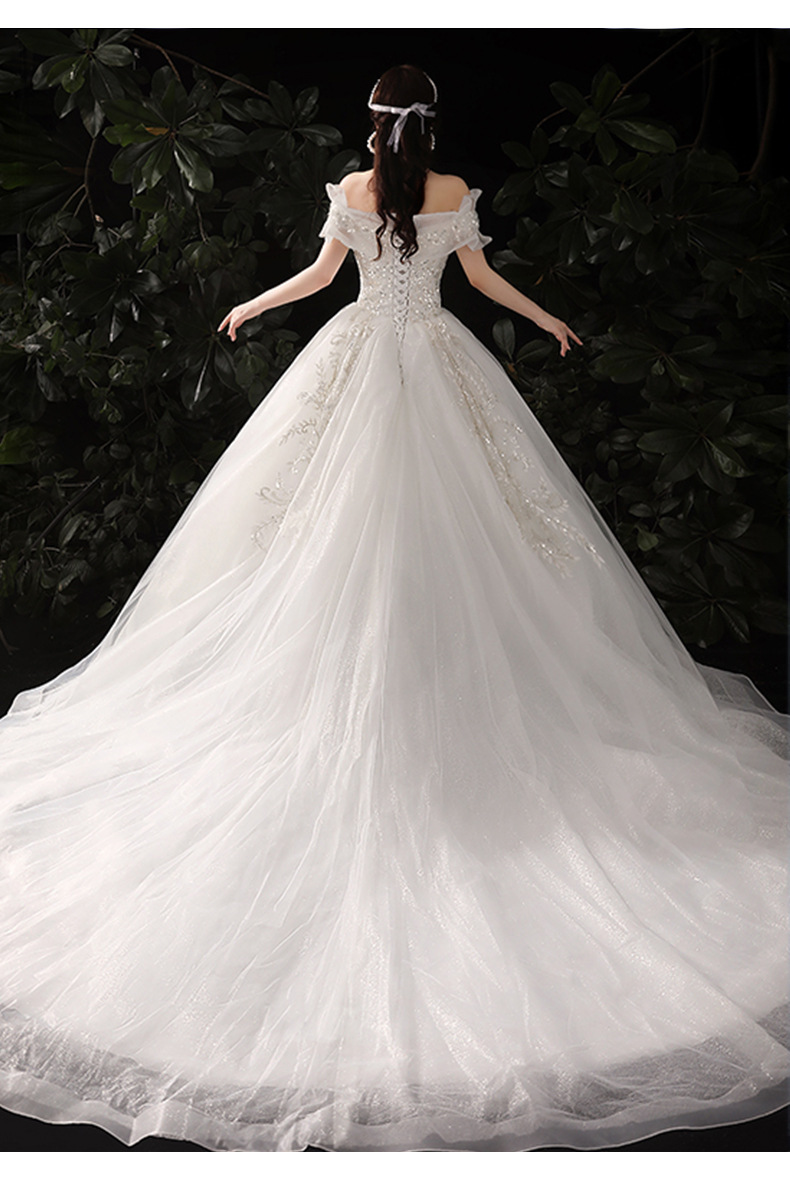 一字肩拖尾轻婚纱2021新款高端梦幻婚纱礼服新娘森系绑带法式婚纱