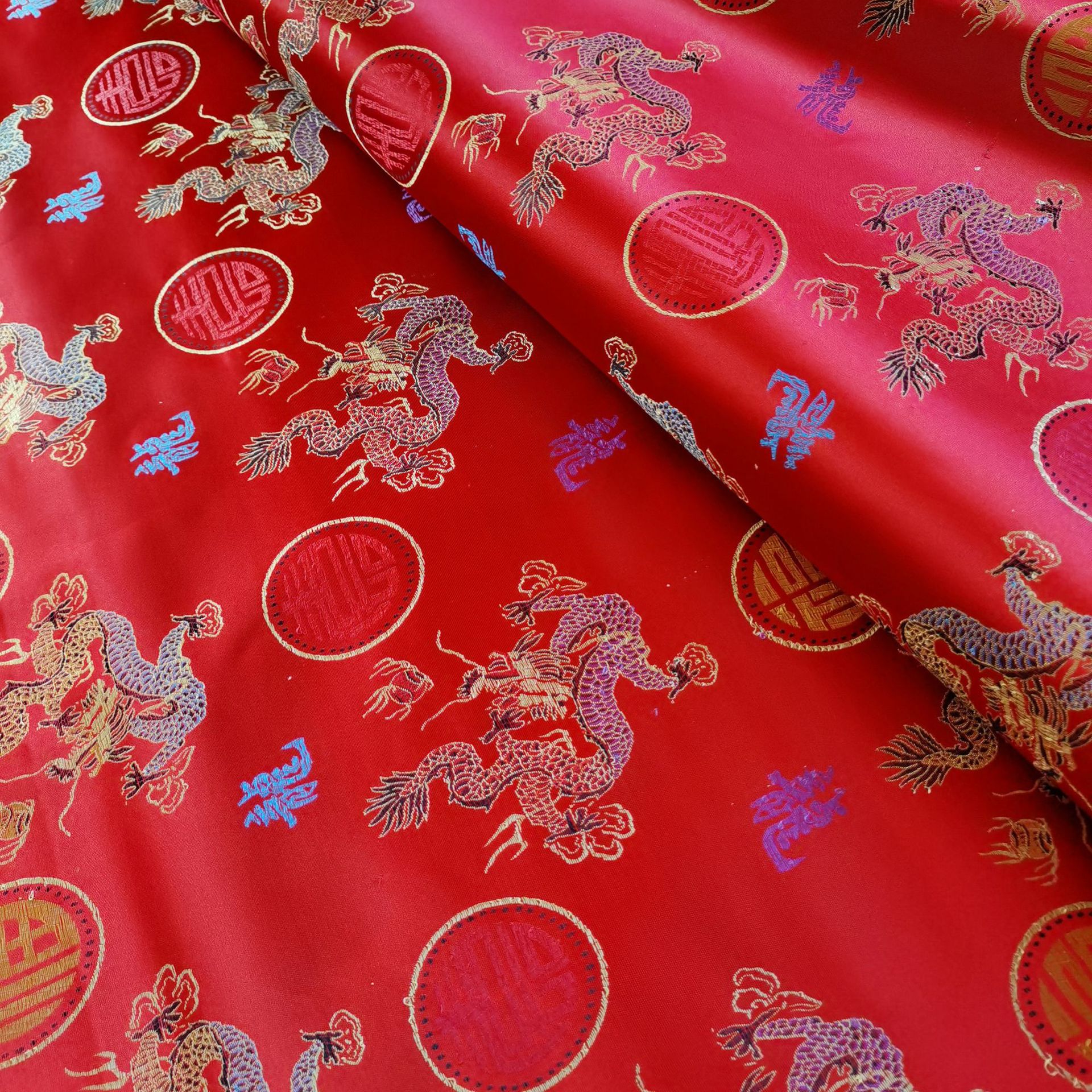 90尼龙织锦缎布料寿衣服装面料