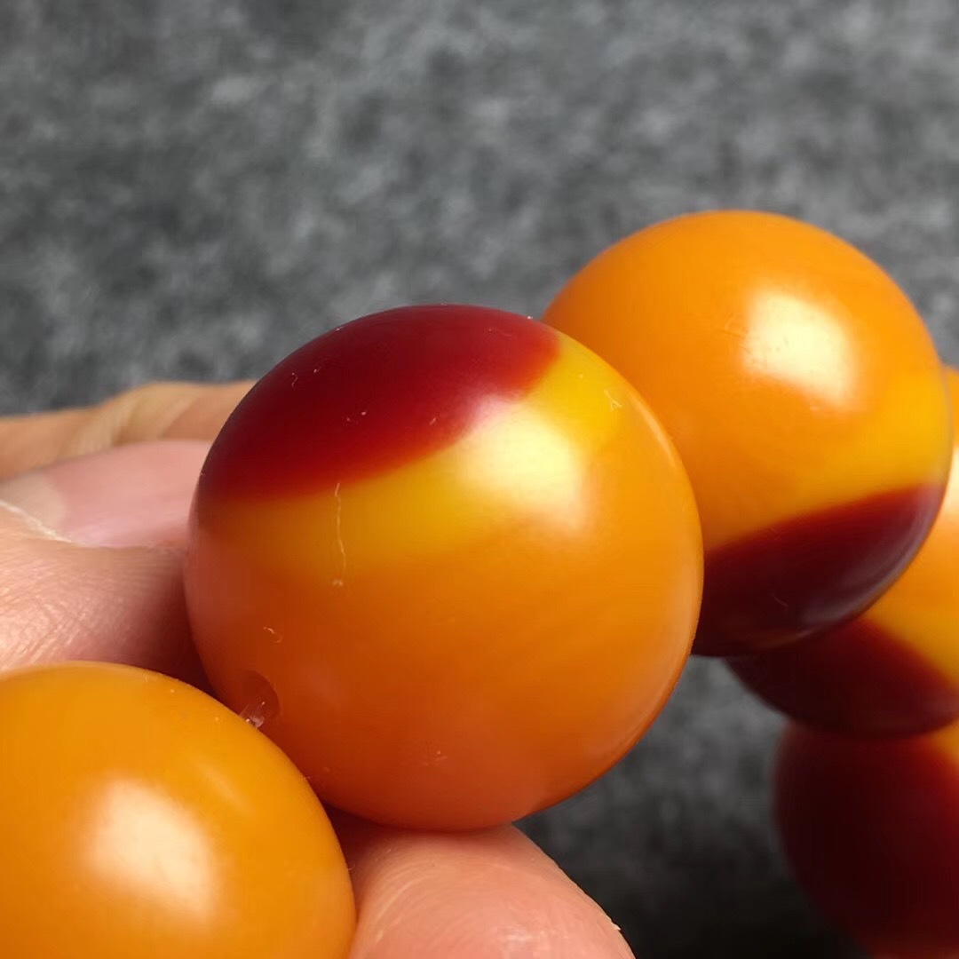 高仿鹤顶红鸟头珠子手串有钙化层骨牙角文玩