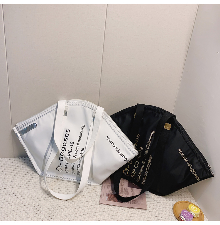 泰国潮流新款设计个性口罩帆布手提包大容量时尚环保购物袋单肩包