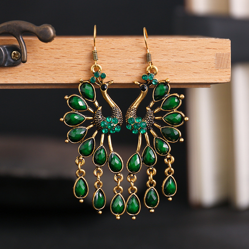 Creative Retro Peacock Ethnic Style Hollow Earrings Personality European and American Earrings Dark Green Diamond Metal Alloy Earrings Wholesale