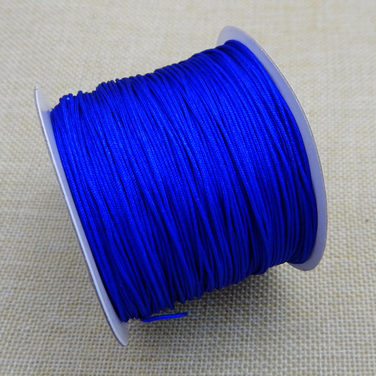 5号大卷玉线 材质:锦纶 工艺:  纺织 形状:圆形 规格: 71号玉线粗0.