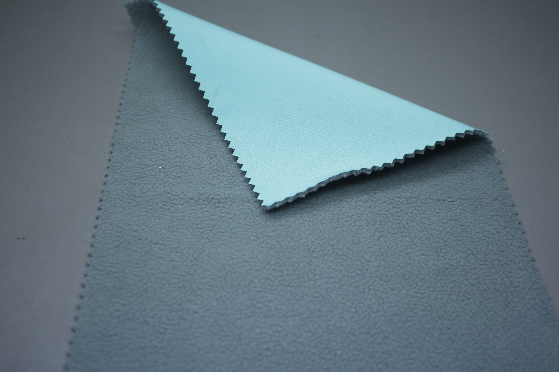 现货四面弹100d复合防水面料摇粒绒秋冬软壳三合一冲锋衣登山面料