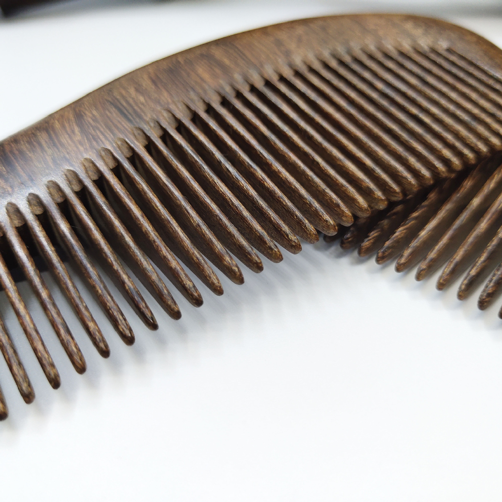 精艺黑金檀木梳凤凰形木梳子 厂家直销可来样定制刻花及logo