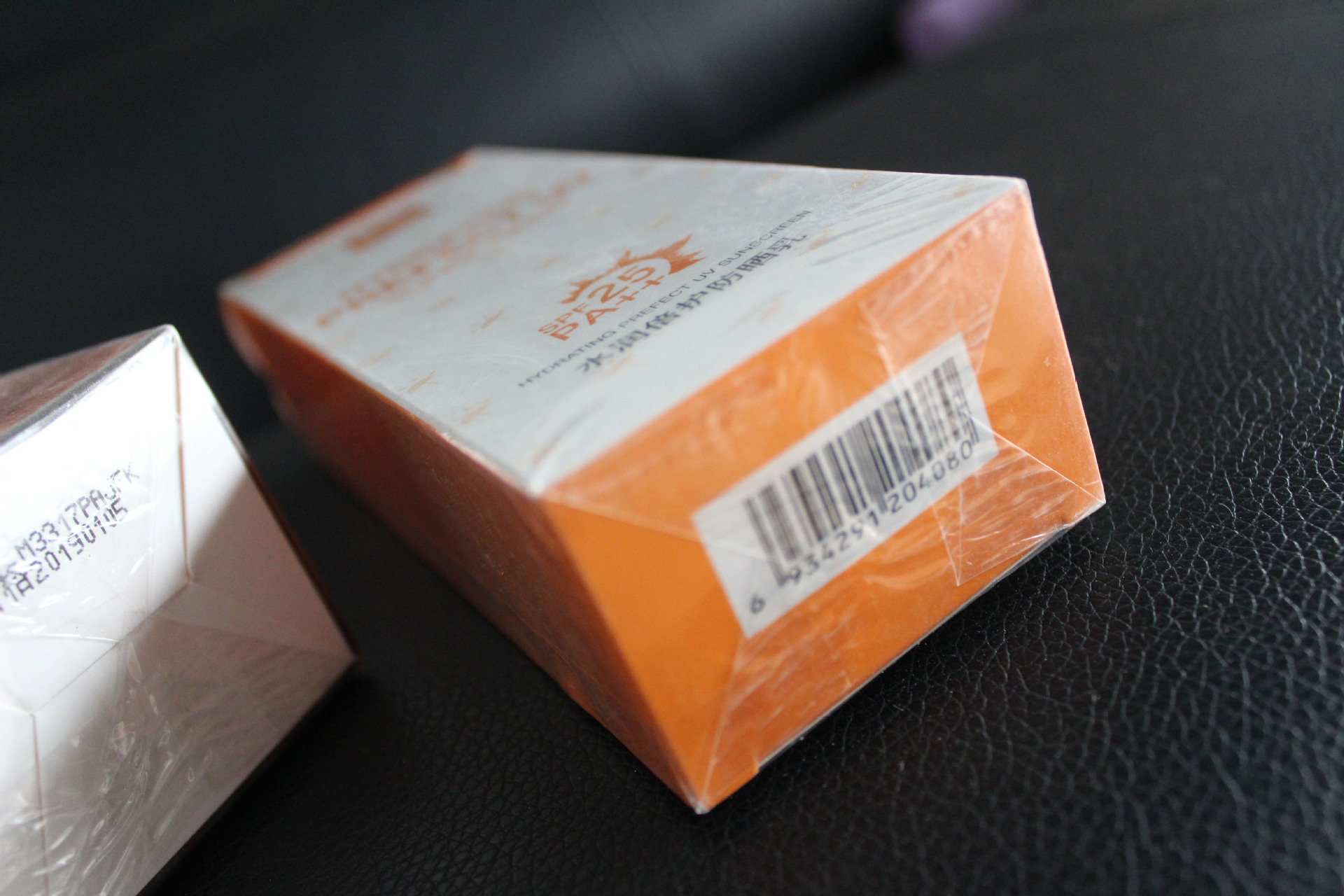 肇庆高透明茶叶纸盒包装膜 化妆品香烟金拉线塑封 烟包膜定制