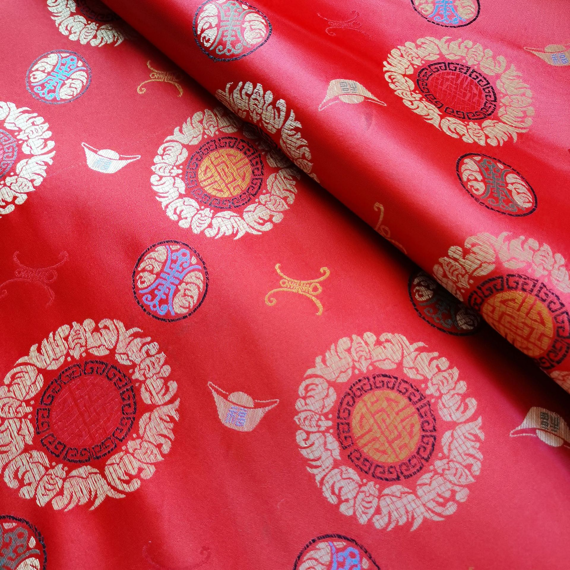 90尼龙织锦缎布料寿衣服装面料