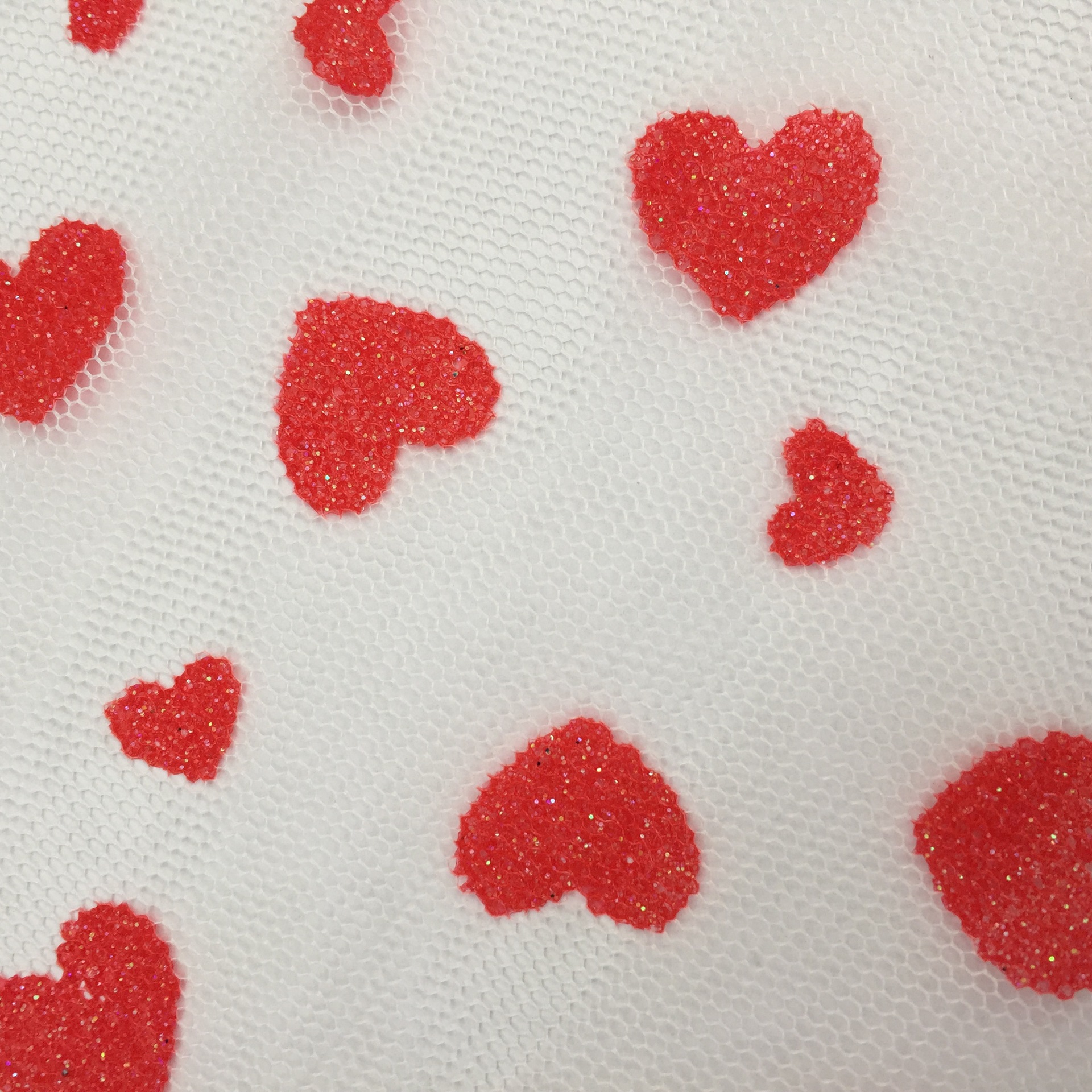 台版印爱心网布 大小爱心服装面料 工厂直销