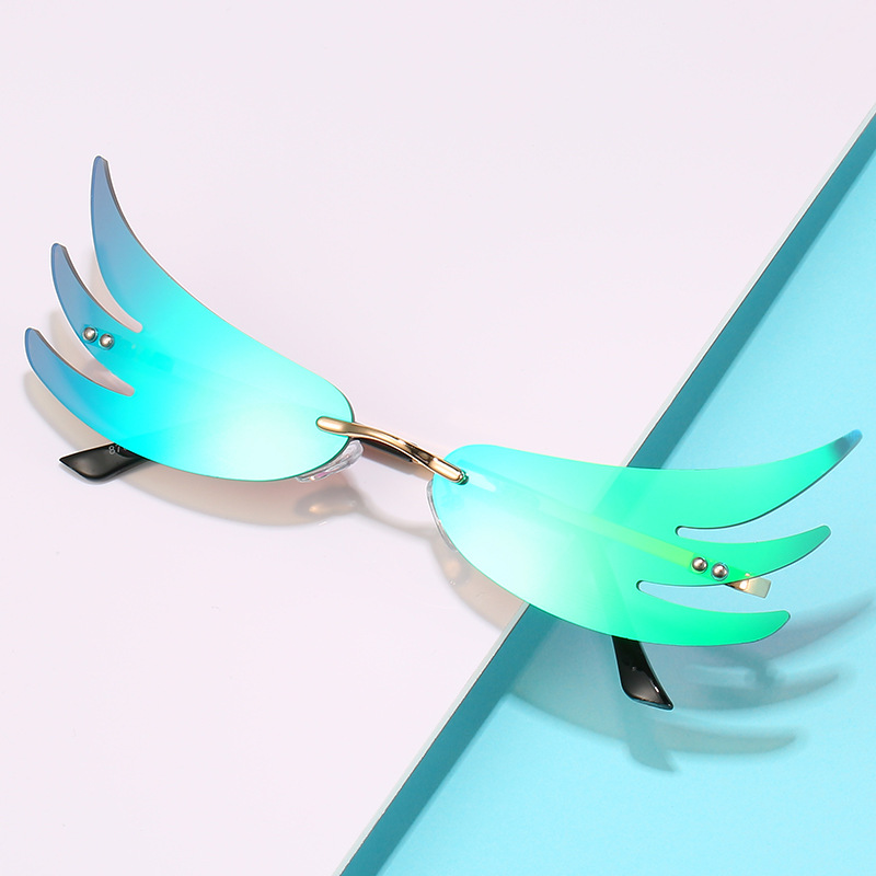 新款个性火焰太阳镜男女无框墨镜欧美潮流舞会翅膀搞怪时尚眼镜