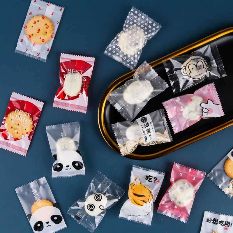 厂家直供网红奶枣包装袋新款卡通纽扣饼干机封袋小号糖果袋可定