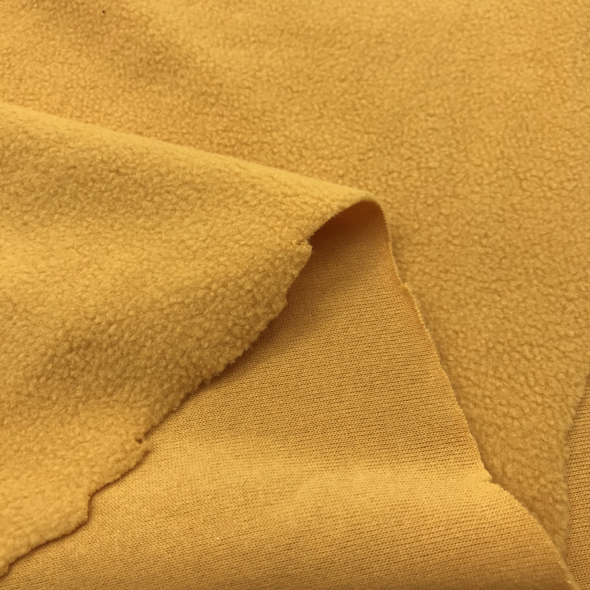 摇粒绒 160g单摇单刷全涤小颗粒绒布 秋冬保暖外套 手套面料现货