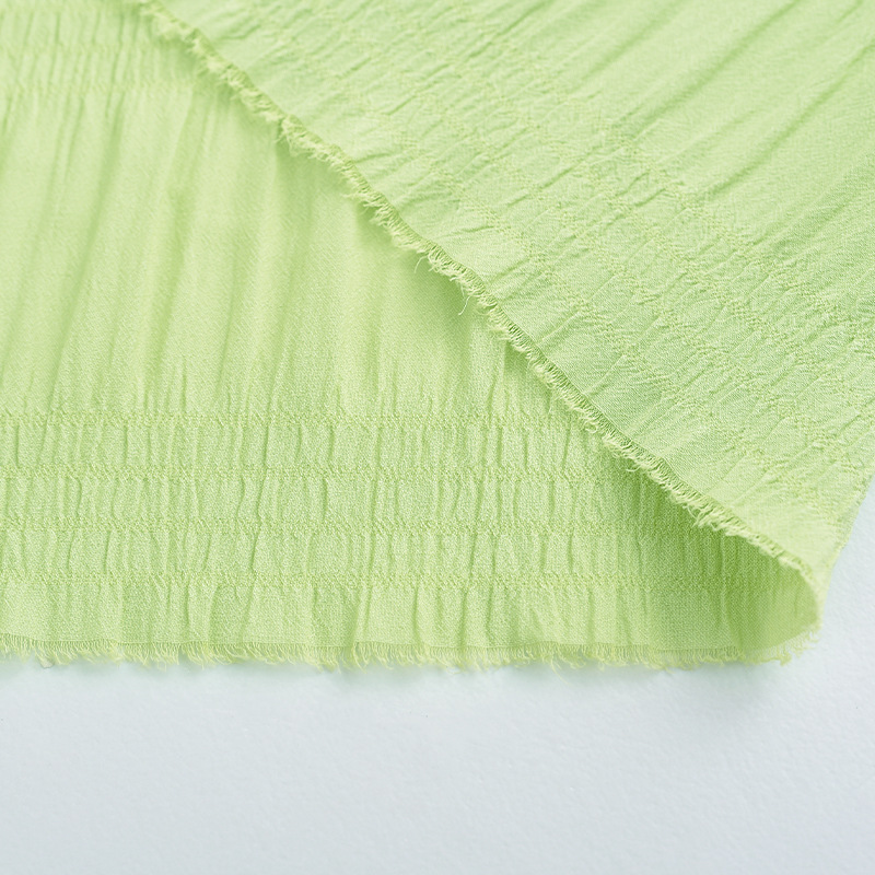 现货翩翩皱面料波浪小条涤纶梭织布女装紧身高腰百褶短裙面料批发