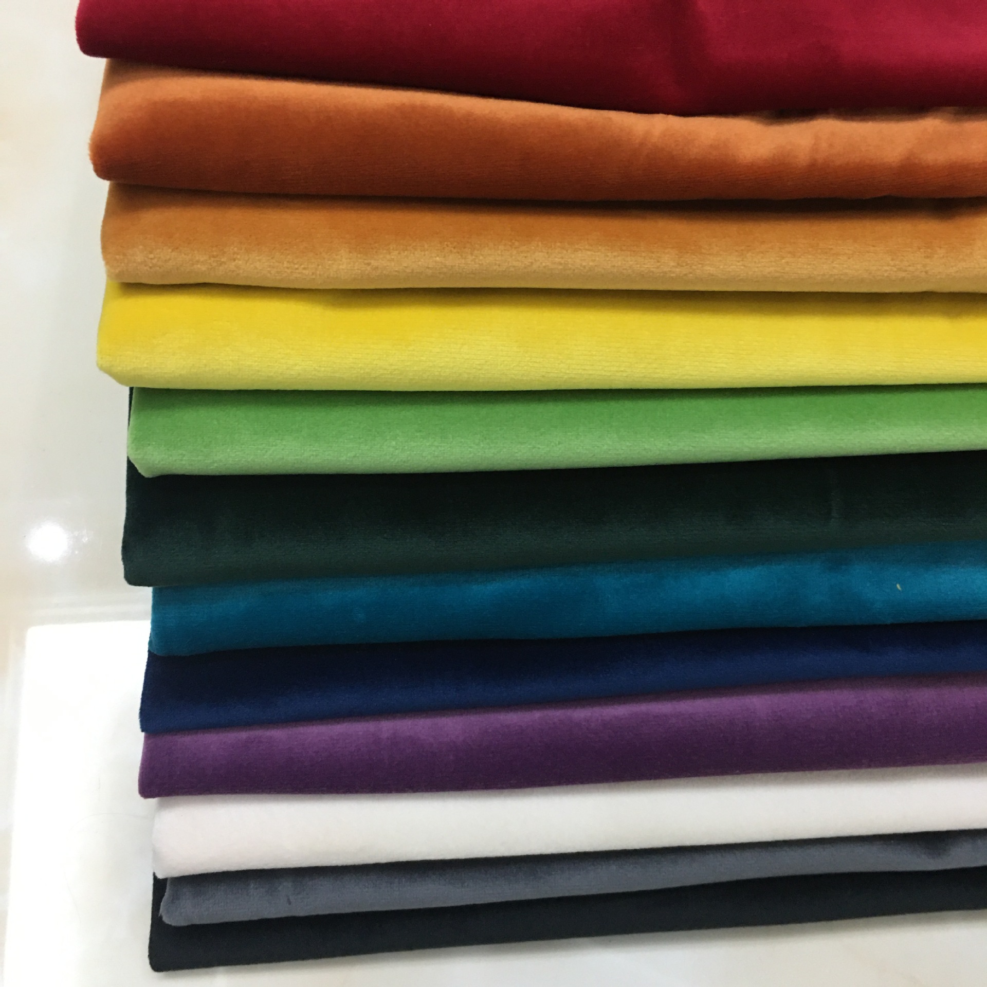 厂家直销现货荷兰绒 天鹅绒布沙发抱枕布纯色服装面料 加厚荷兰绒