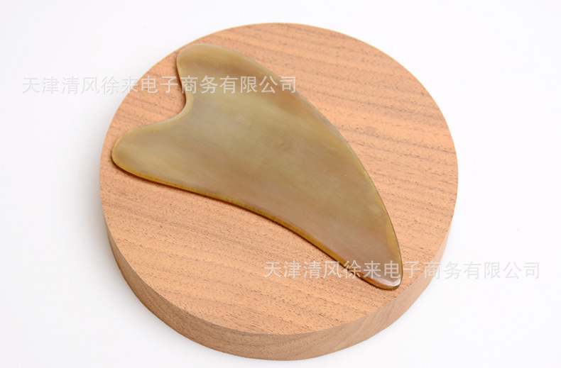 1       材质         牛角       形状         牛角心形刮痧板