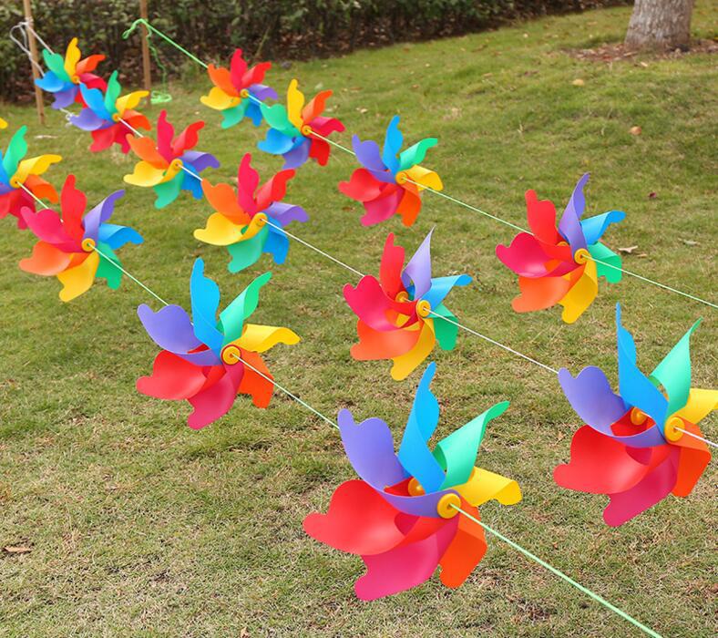 七彩塑料风车串彩色风车材料包幼儿园儿童风车玩具厂家清仓包邮