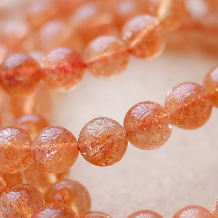 世纪塘朝珠宝 精致精美金太阳石水晶手串女 6a天然金草莓晶手链