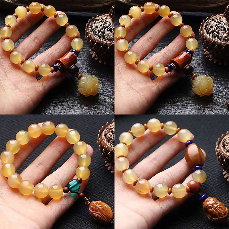 批发西藏天然黄色羊角骨质骨雕圆珠单圈男女情侣手羊角佛珠手串