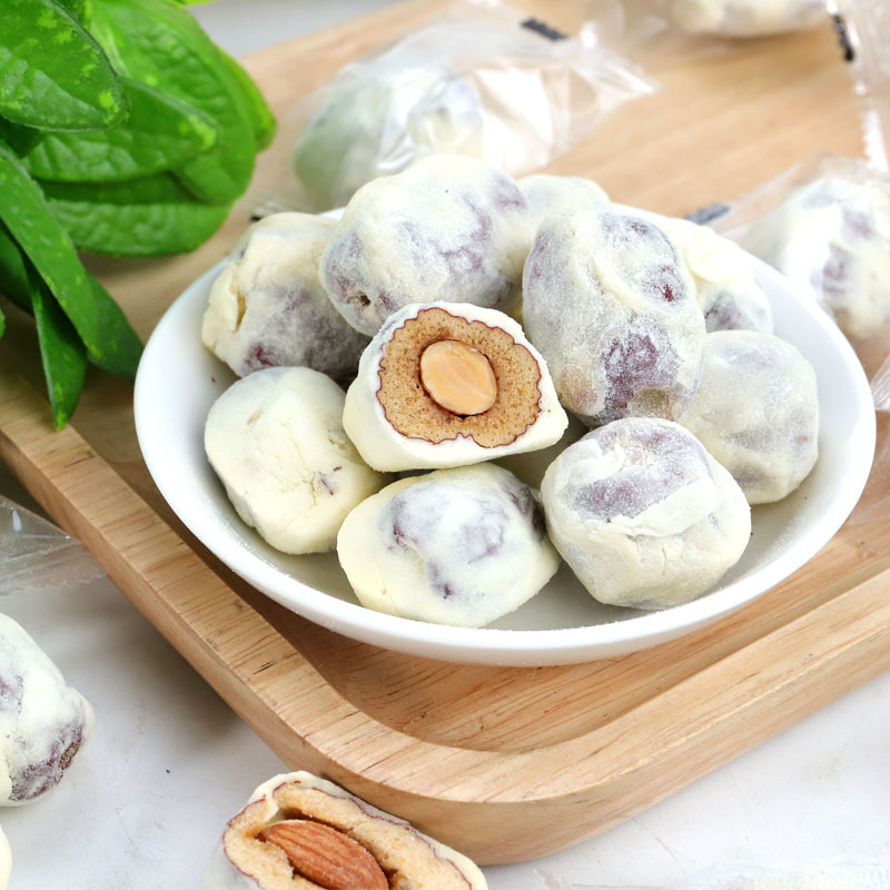 可可味巴旦木奶枣夹杏仁休闲零食无核奶酪枣散装原味奶枣批发