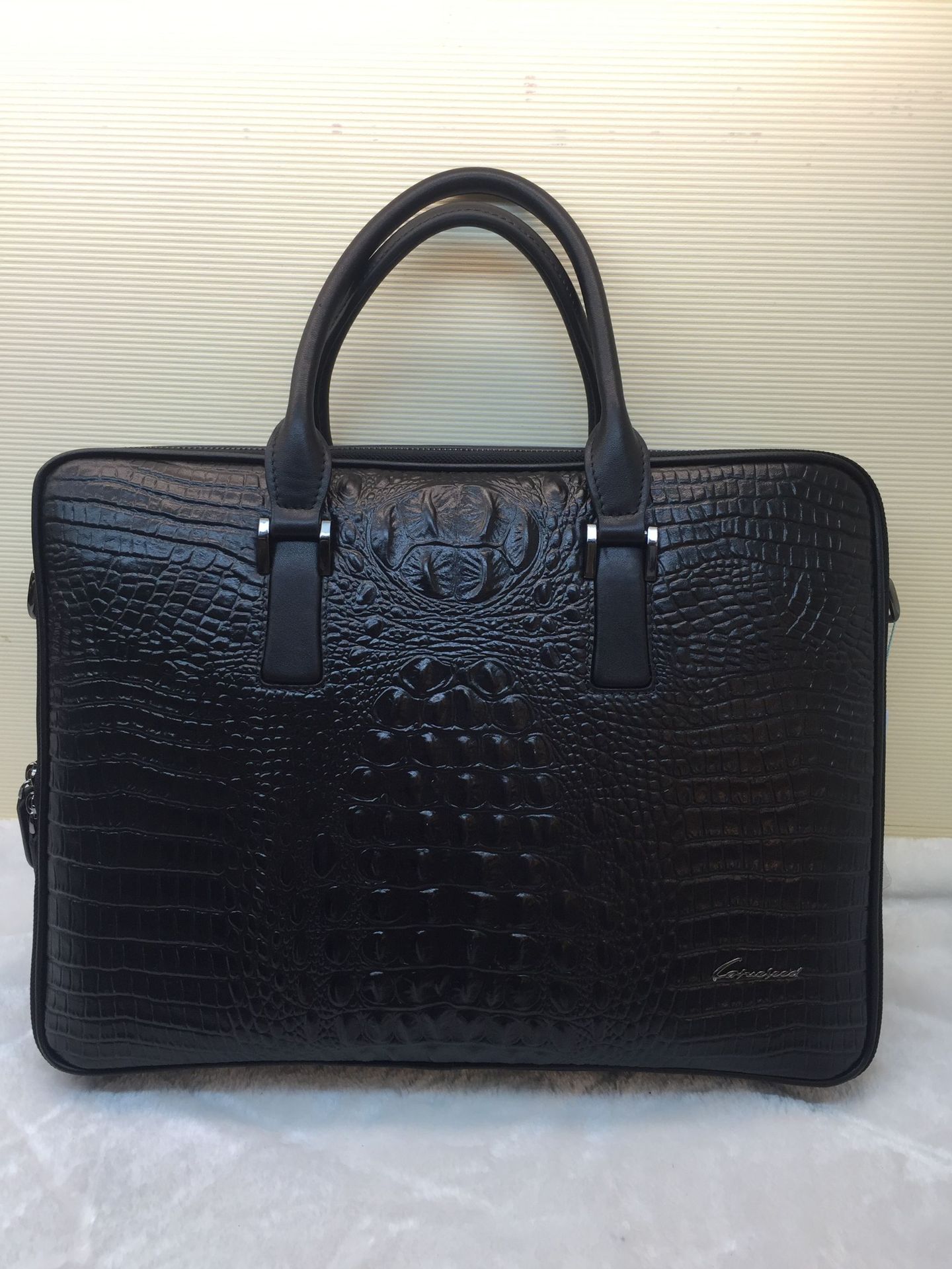 劳斯帅特牛皮男包