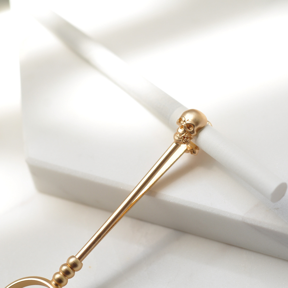 原创小众摇滚金色骷髅烟托戒指女士通用抽烟指环夹烟器防手指熏黄