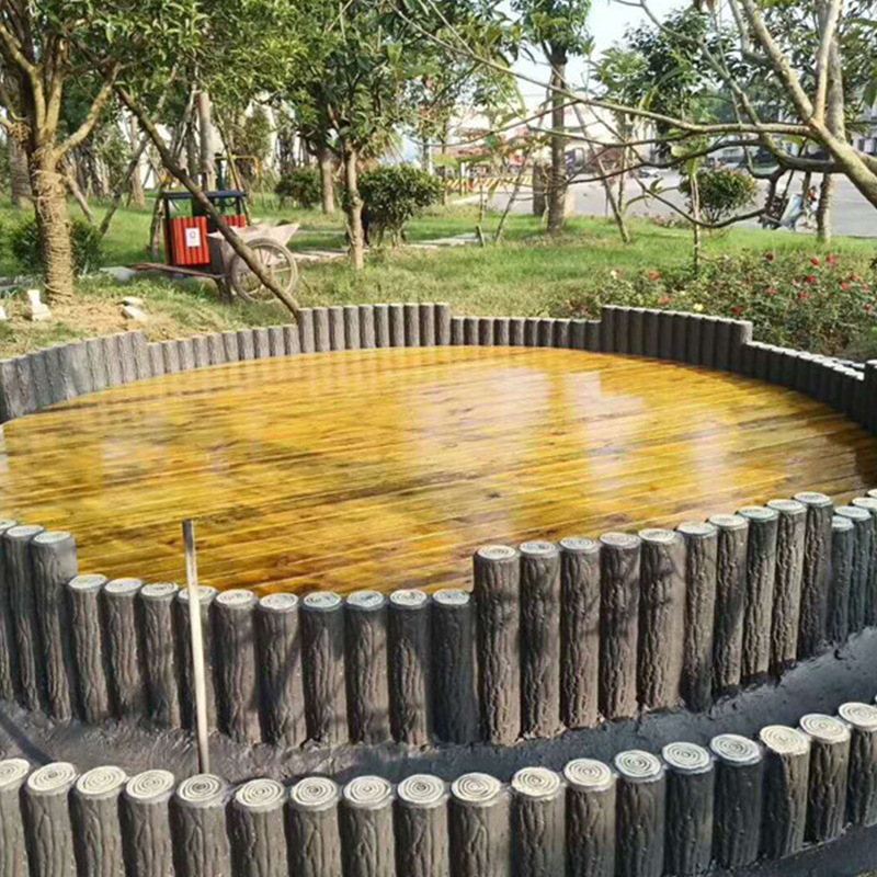 厂家定做环保景观水泥仿木桩 混凝土仿木桩围栏 树桩石草坪围栏