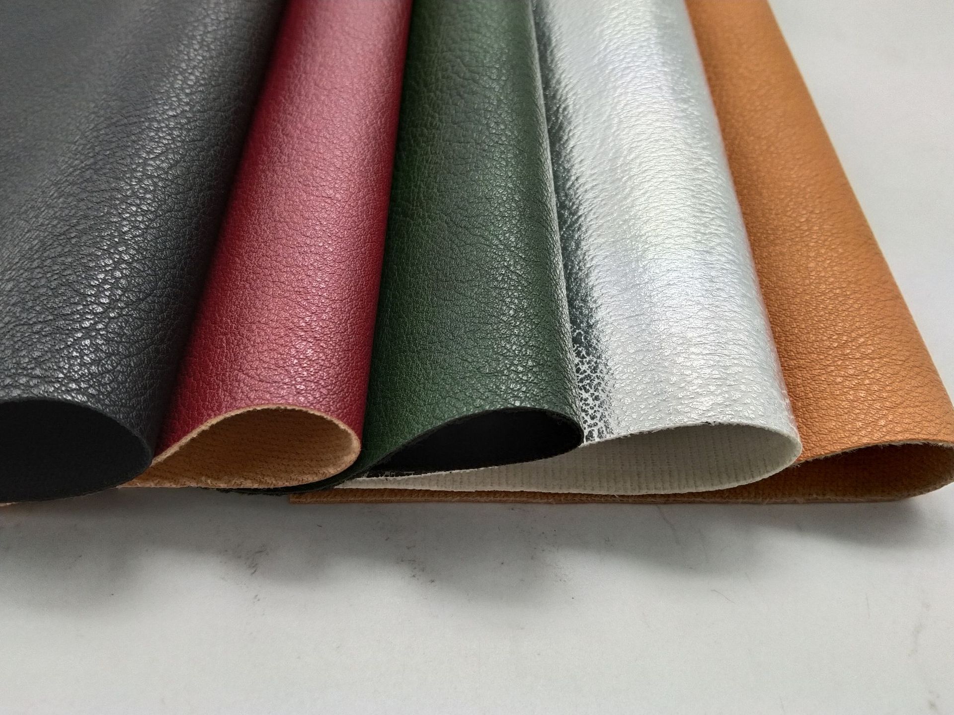 批发pvc人造革服装皮裙箱包皮革皮料1.0mm皮革面料厂家荔枝纹皮革