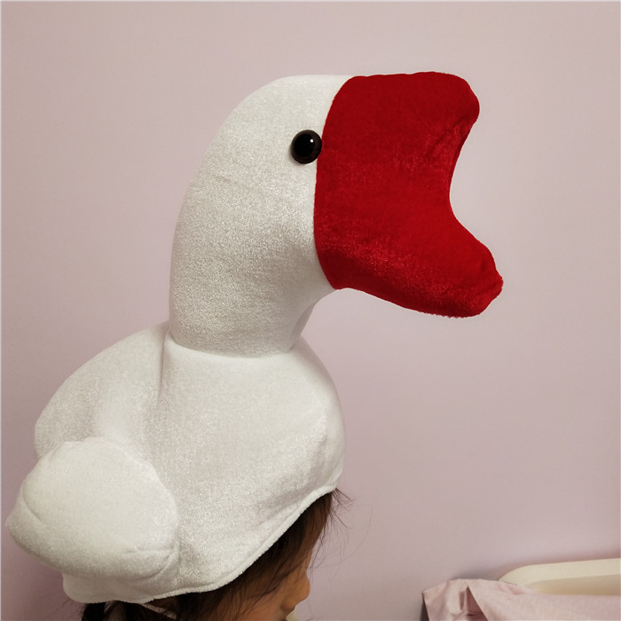 商品描述适用年龄少年(7-14岁)高度成人儿童都可以戴颜色全身白鹅公仔