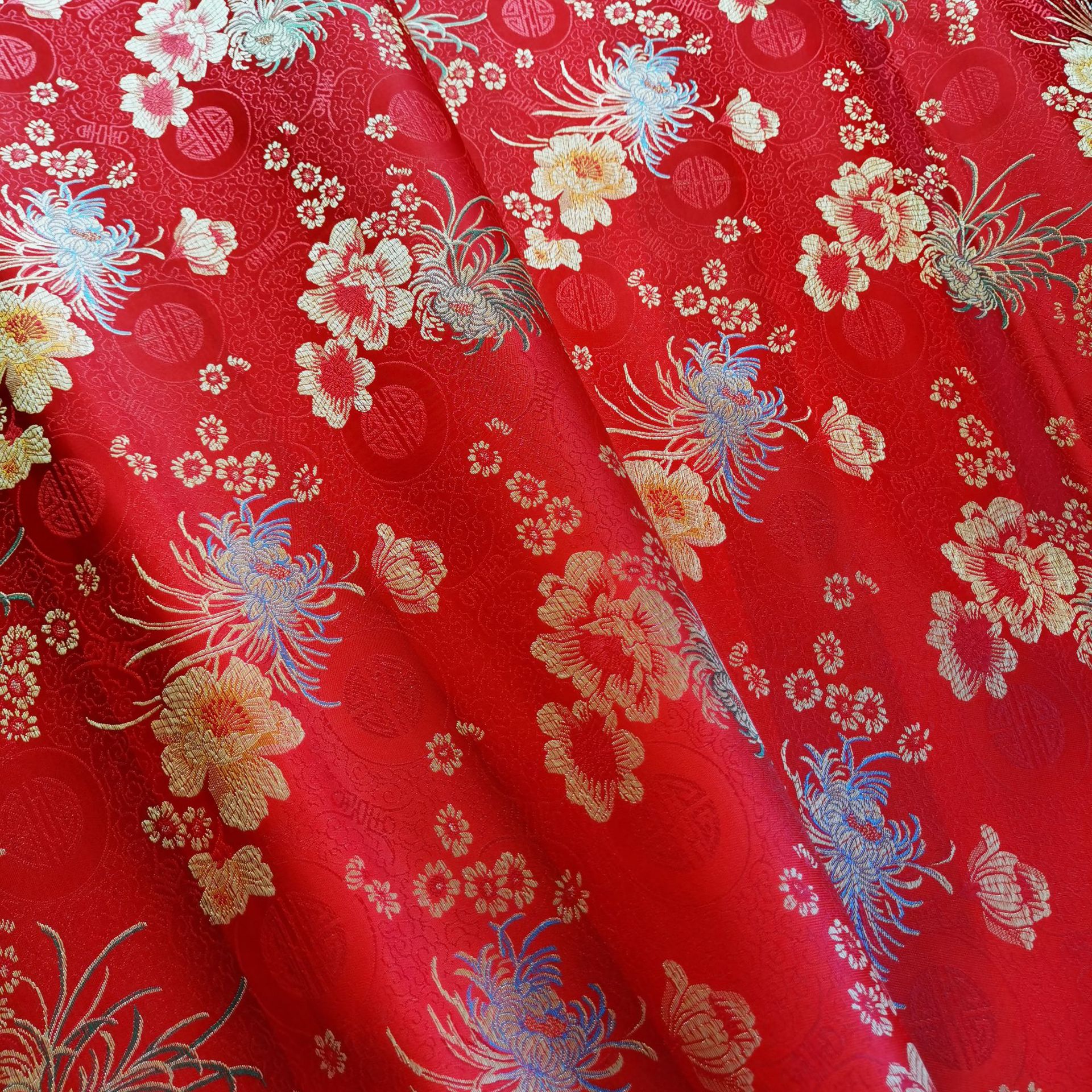 90尼龙织锦缎布料寿衣服装面料