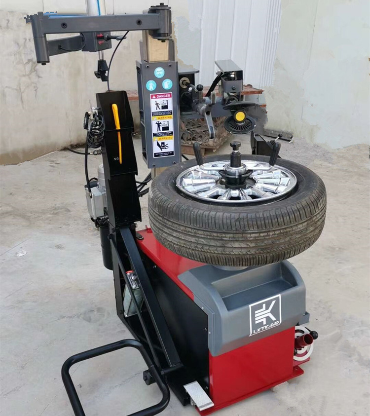 全自动汽车轮胎拆装机后倾式免撬拆胎机扒胎机拆偏平胎防爆轮胎-阿里