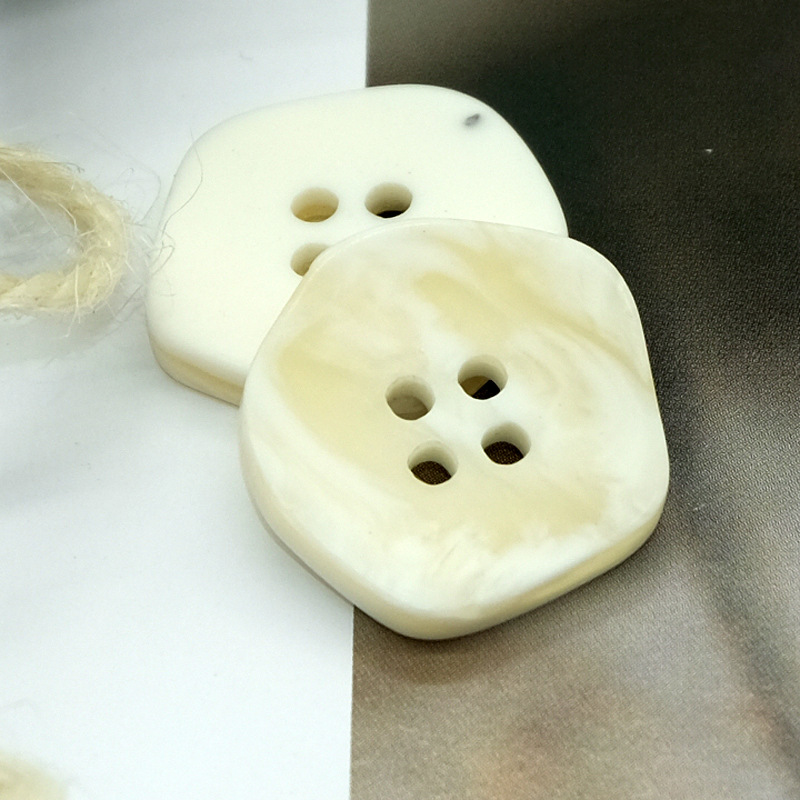 现货树脂钮扣 异形风衣扣 旗袍扣 舞记扣 有眼纽扣 牛仔裤黑白扣
