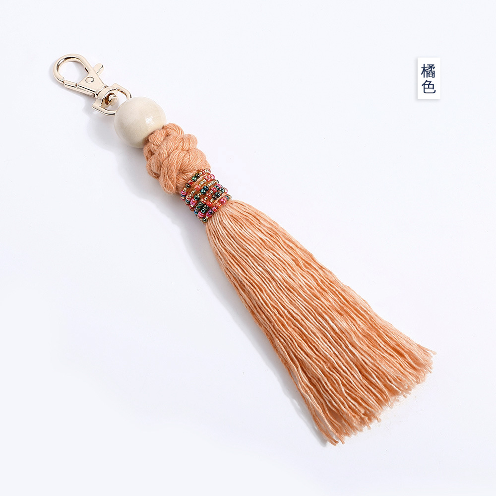 波西米亚流苏复古民族风钥匙扣米珠木珠手工编织绳结包包挂件批发