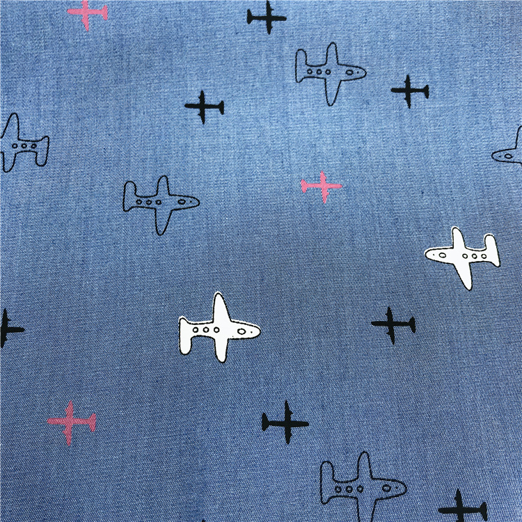 现货天丝牛仔印花面料 浅蓝色天丝牛仔面料童装牛仔裤印花布布料