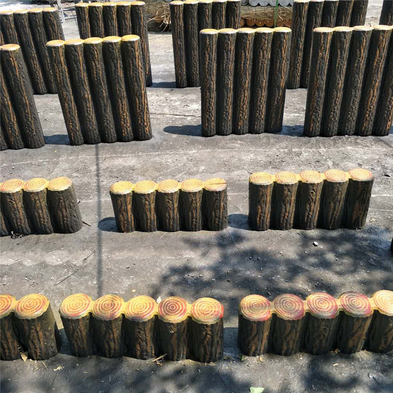 生态河岸水泥仿木桩护栏 景区公园仿木桩混凝土围栏 仿树皮圆木桩