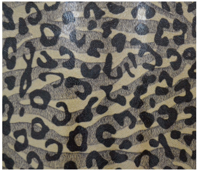 个性创意云豹纹pu革 小豹花纹人造革 箱包手袋鞋帽皮革面料批发