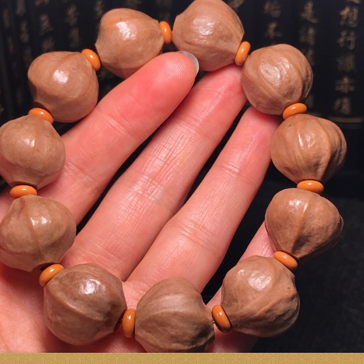 厂家直销精品原皮铁核橄榄核男士文玩易包浆铁核蒜头素串手工雕刻