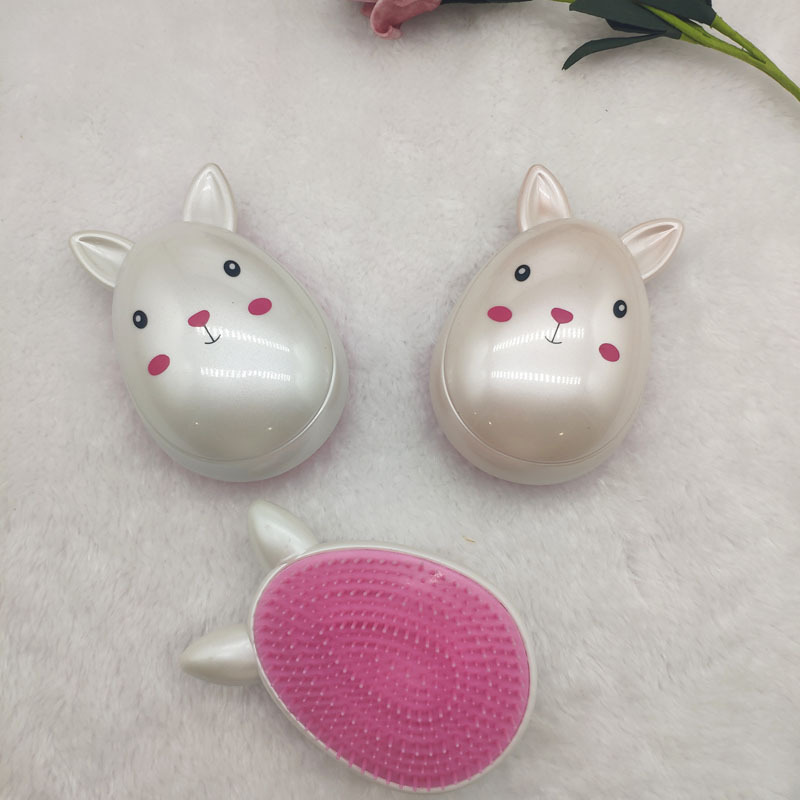 Factory Direct Sales Rabbit Shape Portable Comb Plastic Beauty and Hairdressing PS Spray Paint Pearl Cute Cartoon Egg Comb