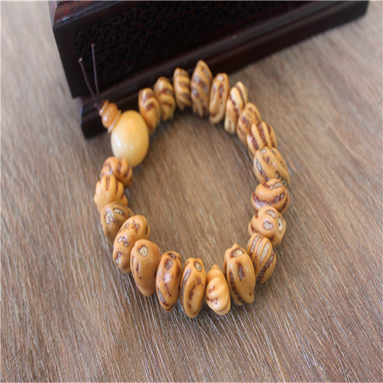 厂家出售龙骨佛手风化菩提佛珠手串自然成黄色文玩名族风男女手链