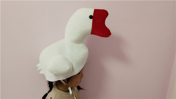 商品描述适用年龄少年(7-14岁)高度成人儿童都可以戴颜色全身白鹅公仔