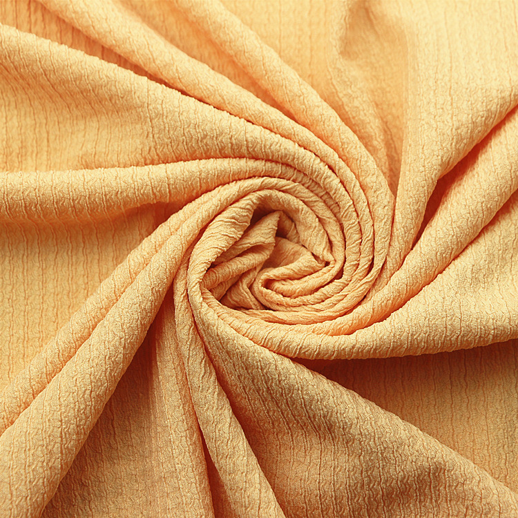 经编涤纶氨纶弹力针织提花凹凸泡泡纱绉布褶皱布时装女装童装面料