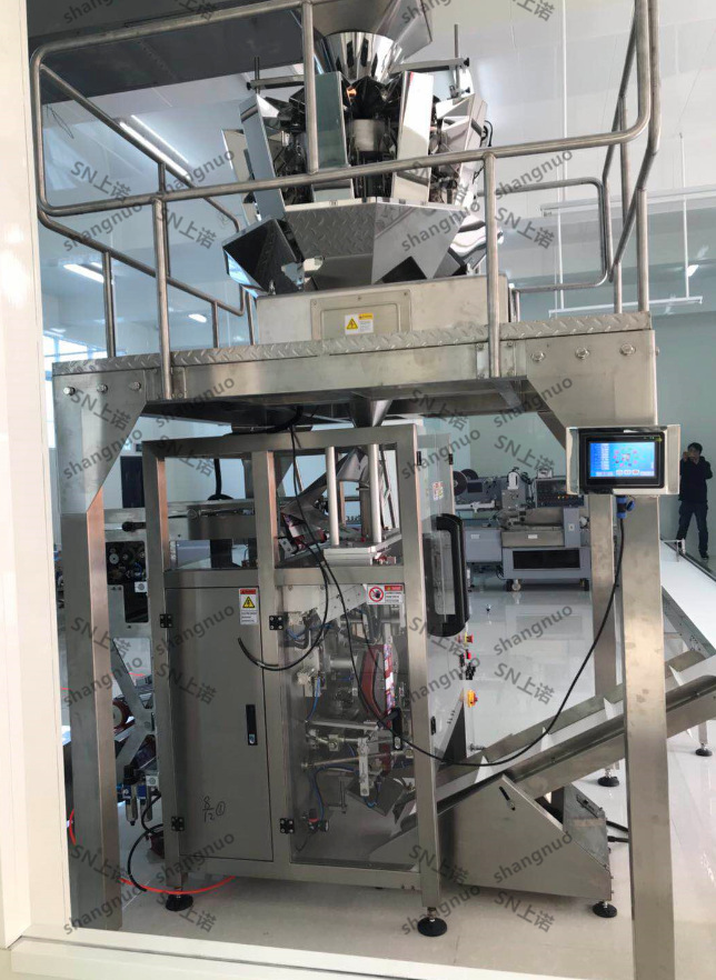 果冻包装机 全自动食品包装设备 水果硬糖奶球全自动称重包装机械