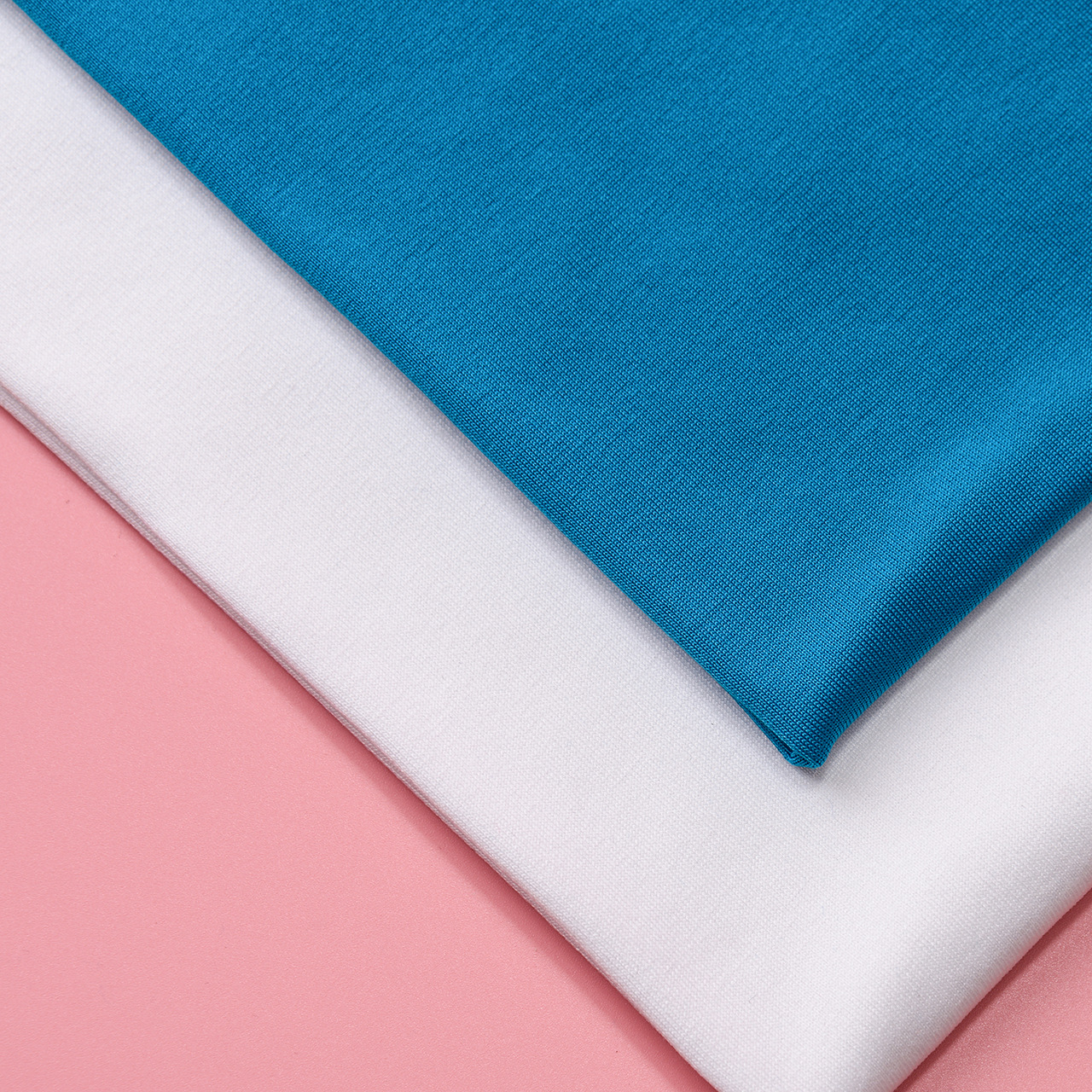 现货100d磨毛牛奶丝抓毛针织面料涤氨四面弹拉毛布运动打底裤布料