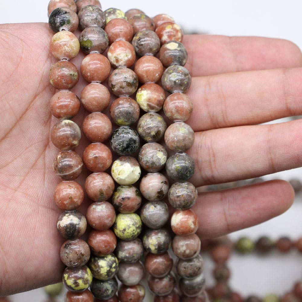 厂家直销 天然石梅花玉散珠圆珠 diy手镯手串 梅花石半成品批发