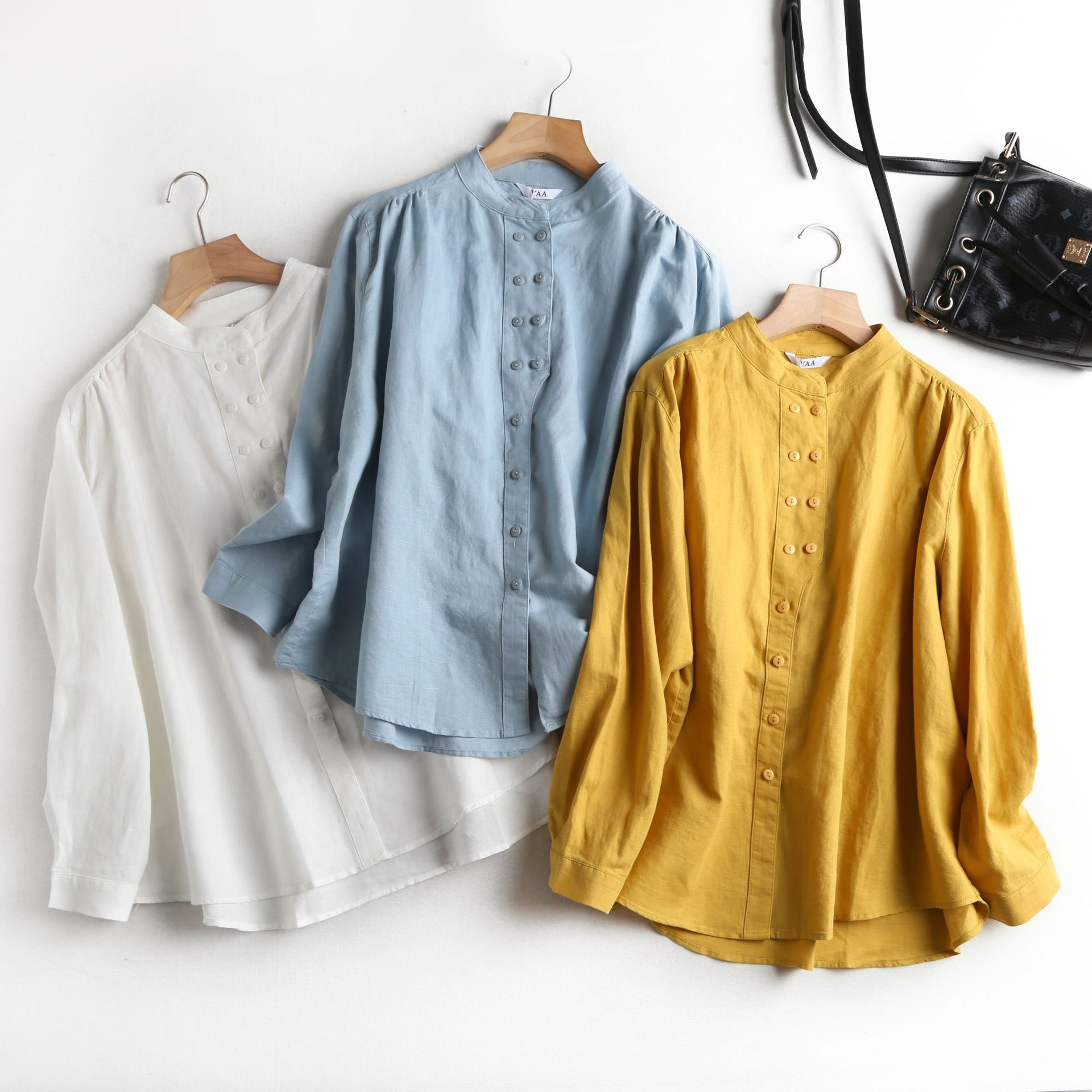 2020春季新款韩版宽松棉麻立领衬衫女长袖复古不规则纽扣休闲上衣