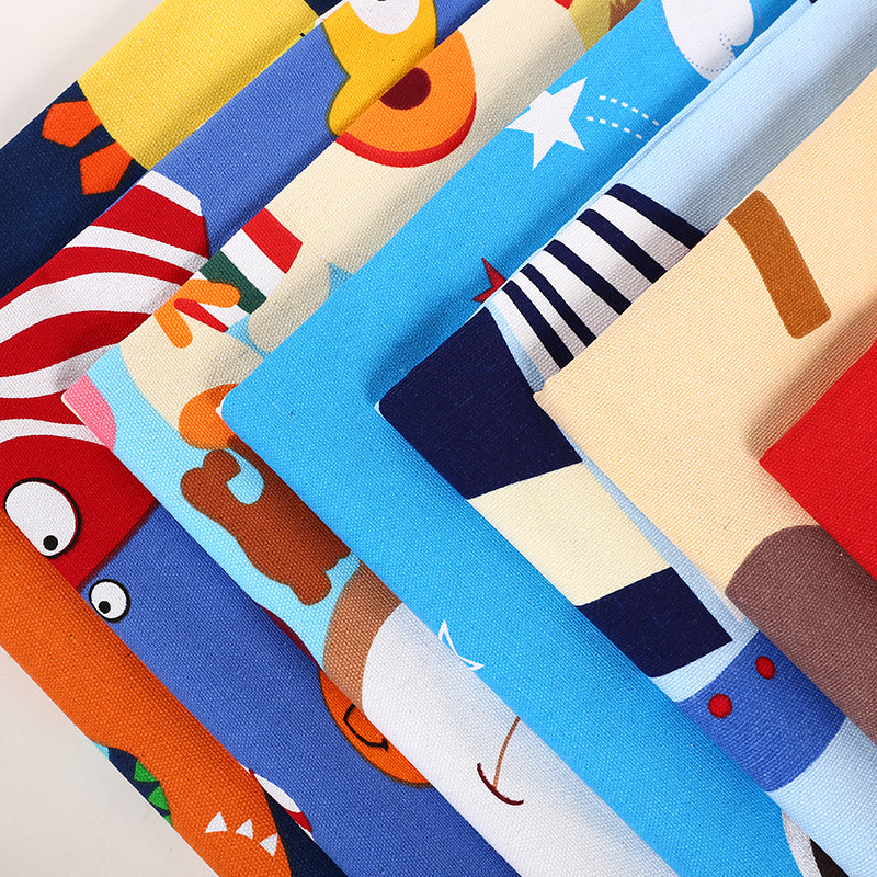 10安加厚涤棉印花帆布布料 厂家供应 卡通箱包桌布沙发 一件代发