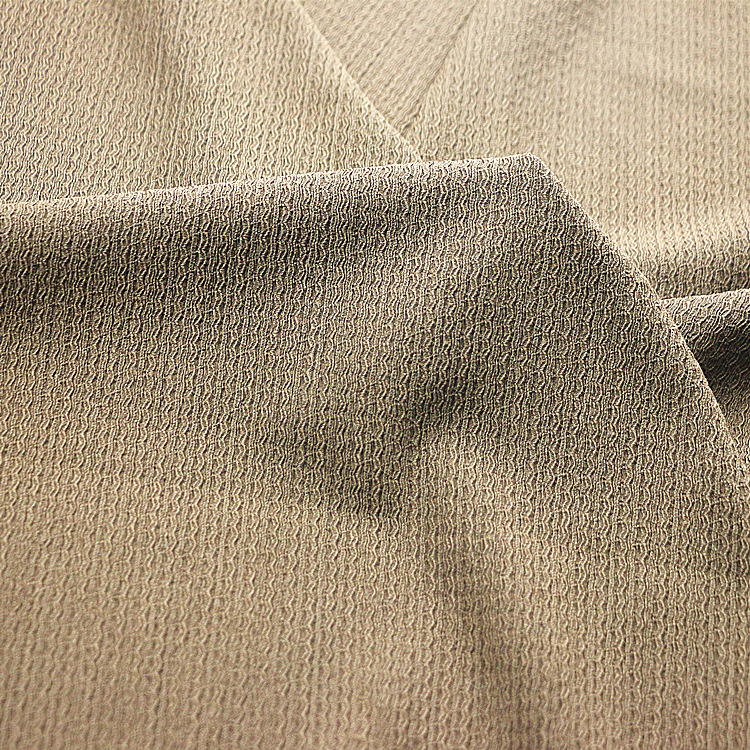 经编涤纶氨纶弹力针织提花凹凸泡泡纱绉布褶皱布时装女装童装面料