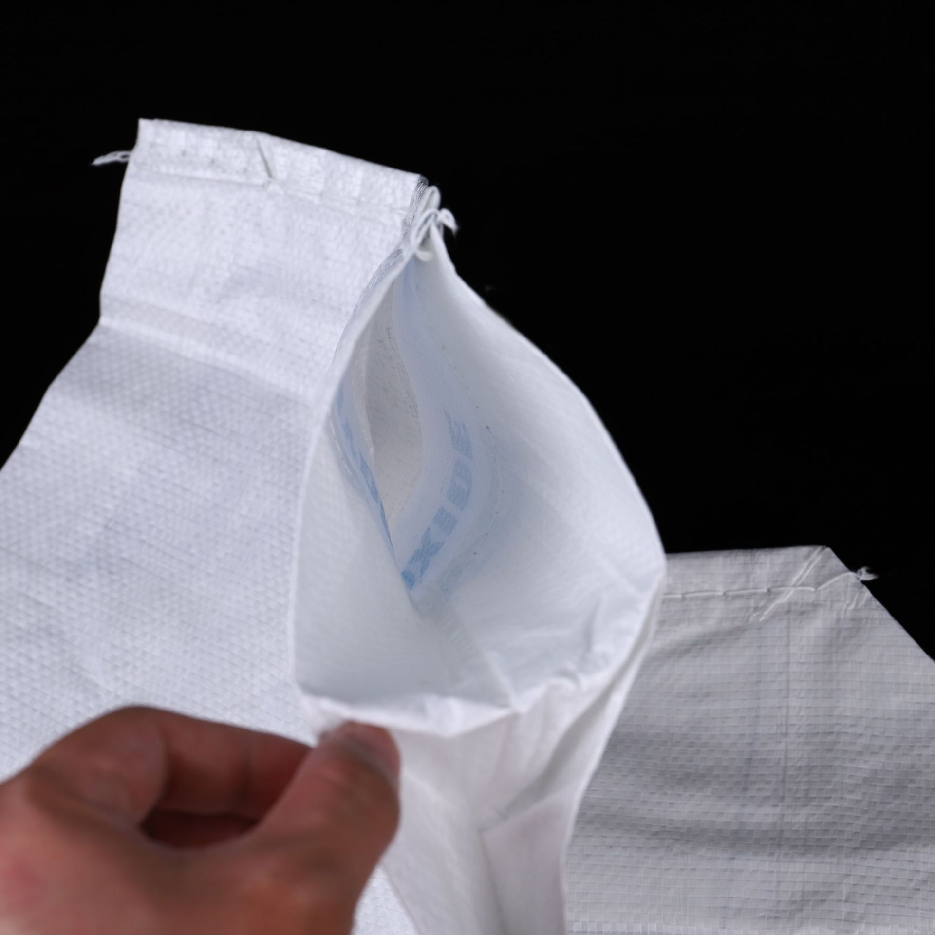 厂家直供白色七字口阀口袋运输打包建筑装修防水编织袋可定制规格