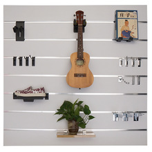 厂家直销大量供应密度槽板MDF琴行吉他乐器万用挂板槽板墙装饰架