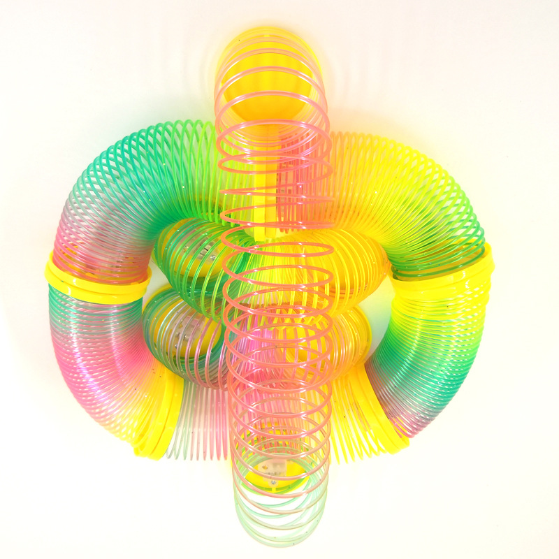 外贸爆款地摊热卖笑脸彩虹圈叠叠圈魔力彩虹圈弹簧圈益智玩具